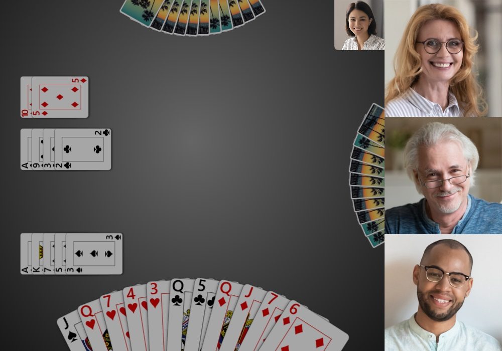 Screenshot of a Trickster Bridge game with the dummy revealed and video chat enabled. Three videos from other players' webcams are shown to the right. A small video preview of the local player's webcam is shown near the top-right.